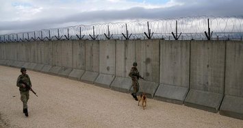 Turkey completes over half of Syria border barrier