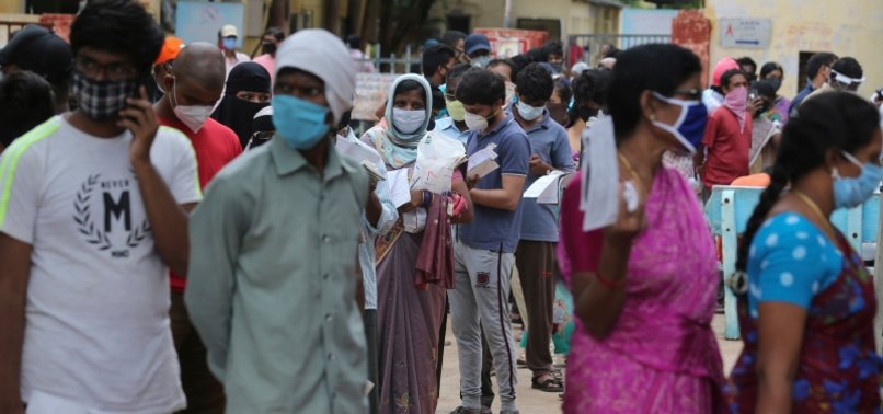 LOCKDOWNS REIMPOSED IN INDIA AS VIRUS CASES NEAR 1 MILLION