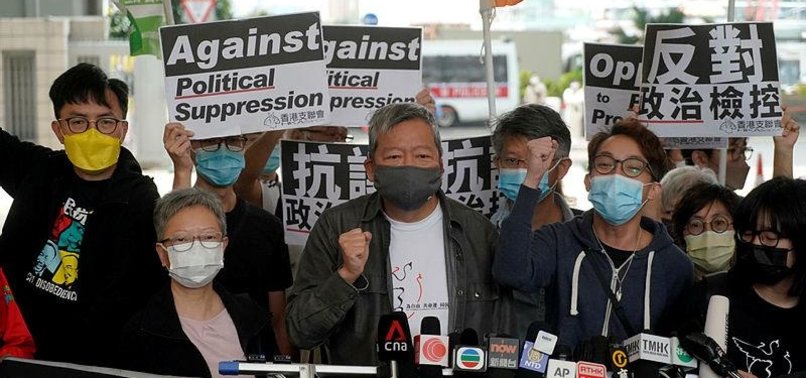 HONG KONG DEMOCRACY LEADERS GIVEN JAIL TERMS AMID CRACKDOWN