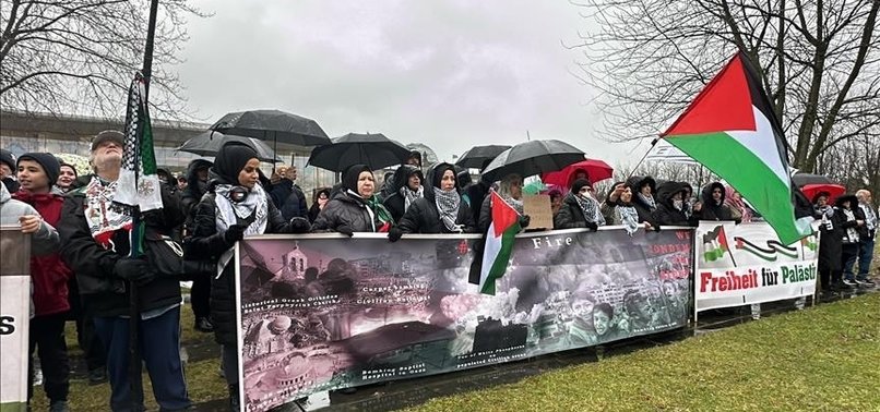 PRO-PALESTINE PROTESTERS STAGE RALLY IN BERLIN UNDER HEAVY RAIN
