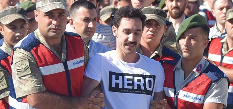 OUTRAGE AS SMILING ERDOĞAN ASSASSINATION PLOTTER APPEARS IN ‘HERO’ T-SHIRT BEFORE TRIAL