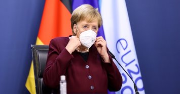Merkel urges Germans to stay home 'whenever possible' as cases peak