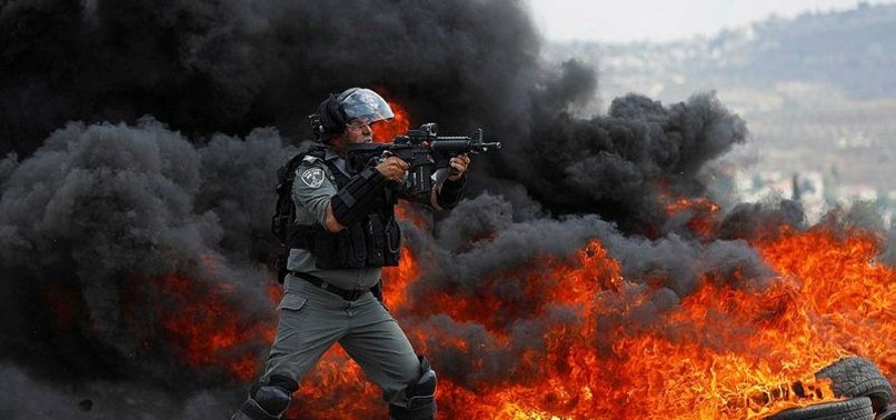 DOZENS OF PALESTINIAN DEMONSTRATORS INJURED BY ISRAELI FORCES DURING A MARCH IN WEST BANK