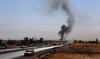 Rockets strike near US base in Iraq, killing 1, wounding 8