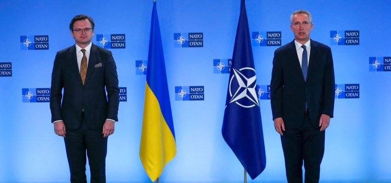 NATO CHIEF SAYS RUSSIA MUST END UP UKRAINE MILITARY BUILD-UP