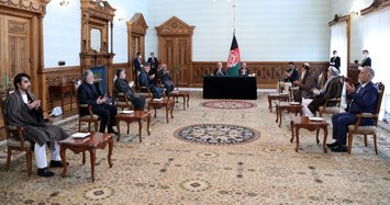 Afghan president and rival announce power-sharing agreement