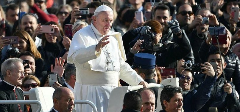 POPE SAYS WORLD MUSTNT TURN A BLIND EYE TO MIGRANTS, THE POOR