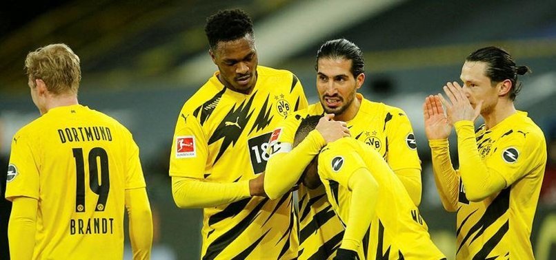 DORTMUND BACK IN CHAMPIONS LEAGUE RACE WITH 2-0 WIN OVER HERTHA BERLIN
