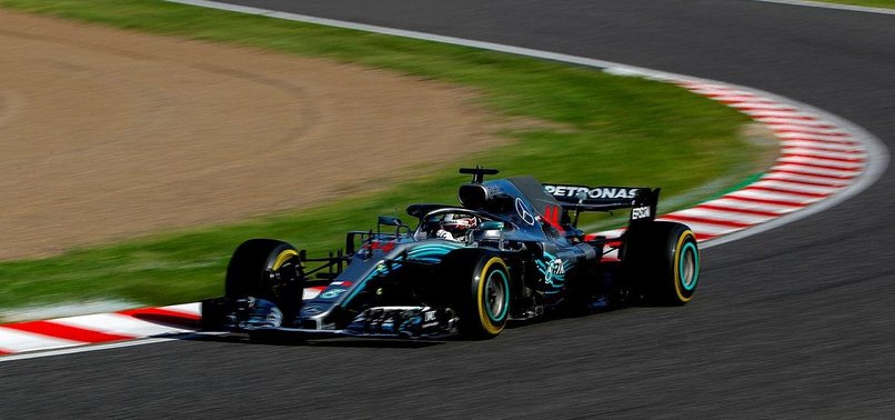 HAMILTON CRUISES TO WIN AT JAPANESE GP, CLOSES IN ON TITLE