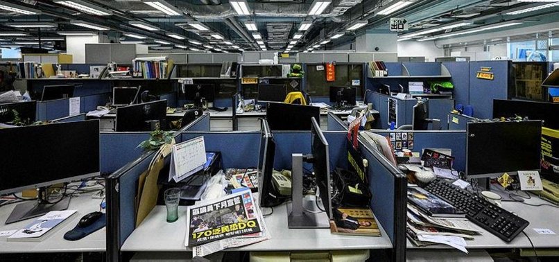EDITORS OF HONG KONG NEWSPAPER ARRESTED UNDER SECURITY LAW