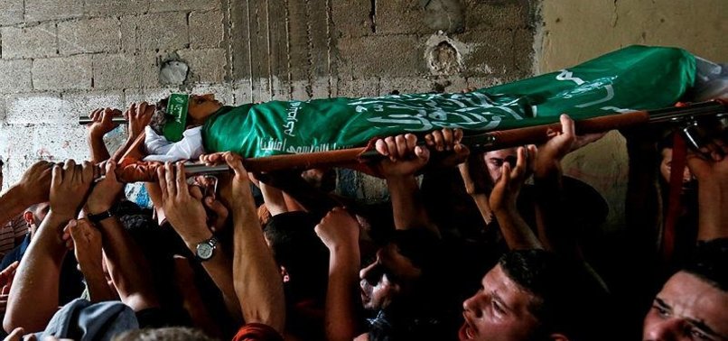 GAZANS BURY 3 MARTYRS KILLED BY ISRAEL