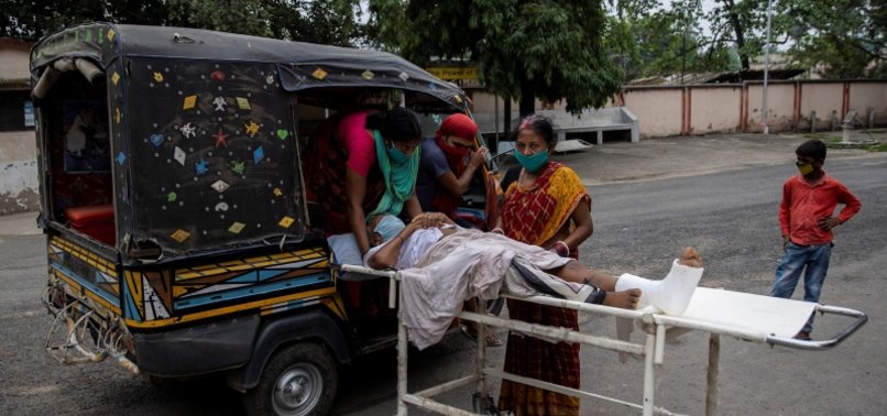 INDIAS COVID-19 CASES JUMP BY 67,000, SETTING DAILY RECORD