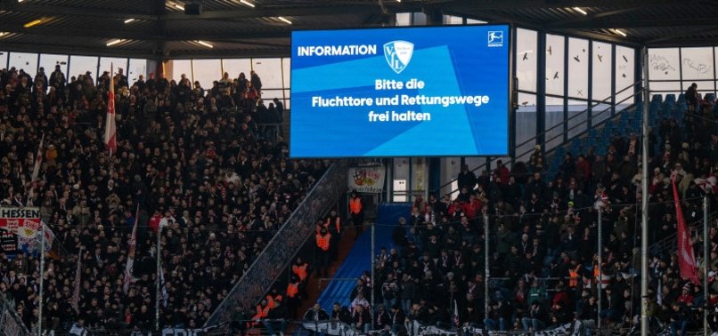 BUNDESLIGA MATCH DELAYED BY 40 MINUTES AFTER FANS REFUSE TO REMOVE FLAGS