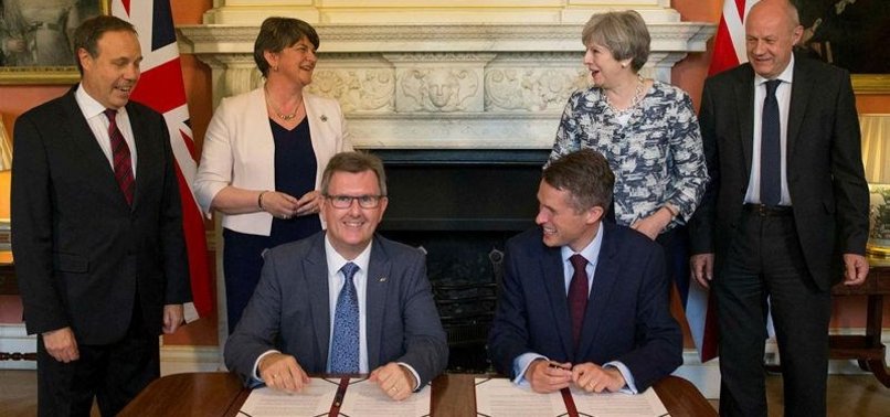 BRITAIN’S CONSERVATIVES REACH MINORITY GOV’T DEAL WITH DUP