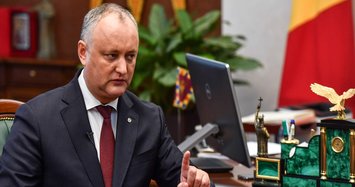 As rivals dig in, Moldova president pushes back against snap election