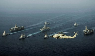 Iran, US warships in first tense Mideast encounter in a year