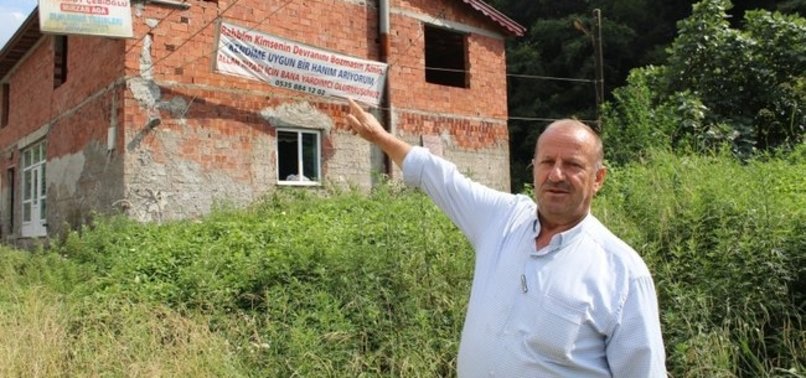 Widower tries to look for new wife through banner