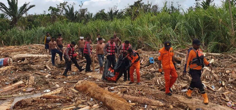 FLASH FLOODS, SLIDES IN EASTERN INDONESIA KILL AT LEAST 58