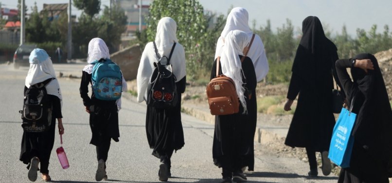 DOZENS OF AFGHAN GIRLS RALLY AGAINST TALIBAN BAN ON EDUCATION