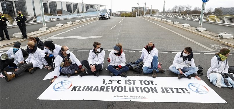 CLIMATE ACTIVISTS IN BERLIN TRY TO BLOCK ROADS TO PARLIAMENT OFFICES