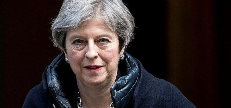 BRITISH PM MAY BACKS CAMBRIDGE ANALYTICA INVESTIGATION