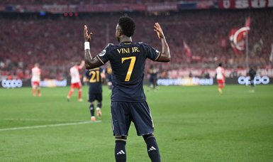 Vinicius Jr's double earns Real Madrid 2-2 draw at Bayern