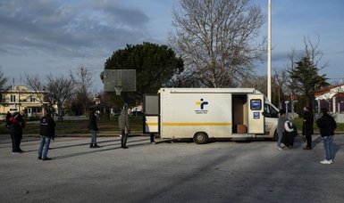 Greece extends curbs, calls in army on Covid tests