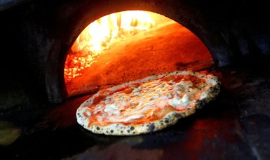Pizza wars: heated words in Italy over fair price of dish