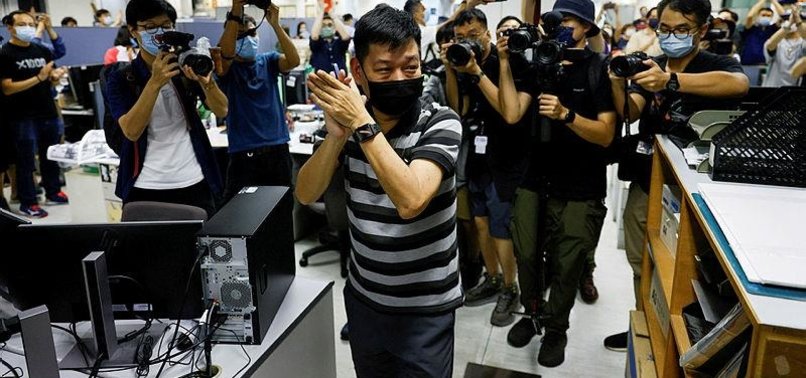 HONG KONG POLICE ARREST ANOTHER APPLE DAILY EDITOR UNDER SECURITY LAW