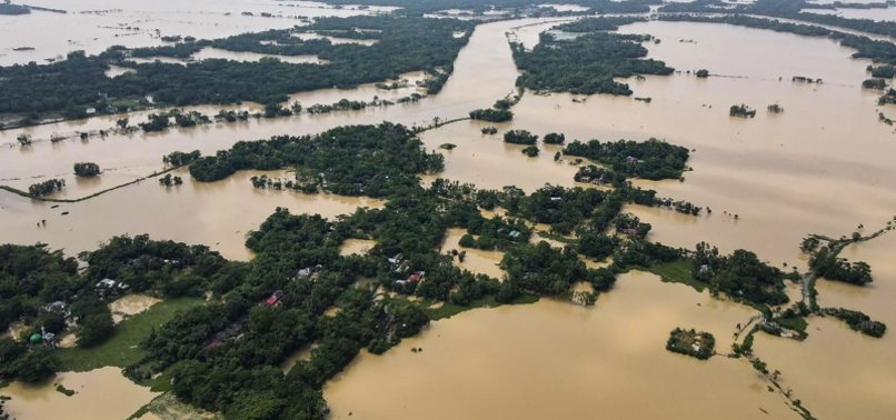 MILLIONS STRANDED, DOZENS DEAD AS FLOODING HITS BANGLADESH AND INDIA