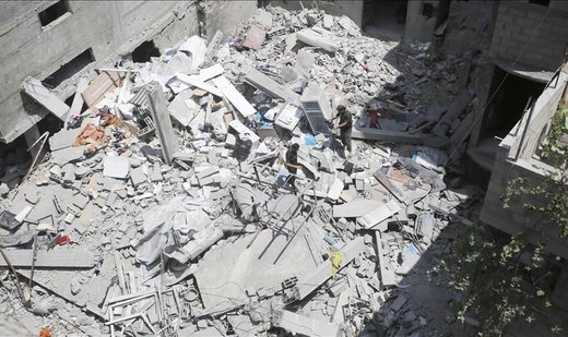 12 killed in Israeli airstrikes on government facility housing displaced residents in Gaza