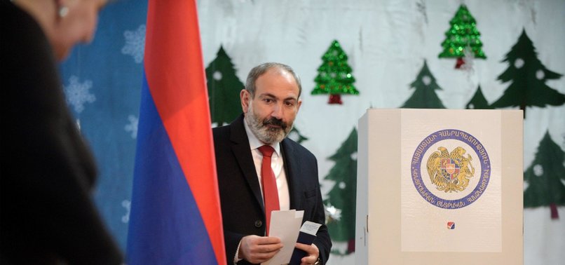 POLARIZED BY WAR, ARMENIA VOTES SUNDAY IN AN EARLY ELECTION