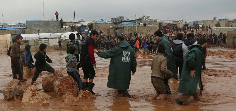 TURKISH AID BODIES LINE UP TO HELP FLOOD-HIT SYRIANS