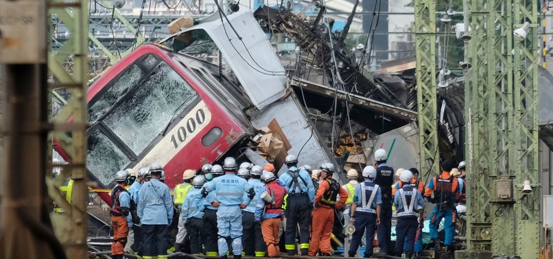 ONE DEAD, 30 HURT AS TRAIN, TRUCK COLLIDE NEAR TOKYO