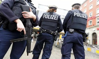 German police conduct searches in probe of real estate firm
