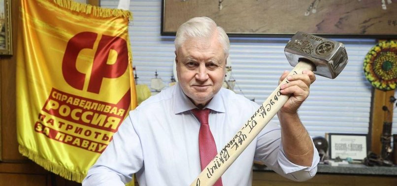 RUSSIAN POLITICIAN SERGEI MIRONOV POSES WITH SLEDGEHAMMER IN TRIBUTE TO WAGNER MERCENARIES