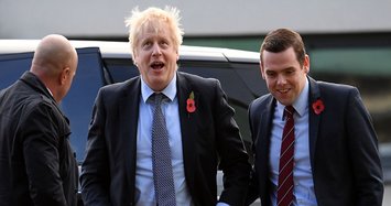 British minister quits over Johnson aide's lockdown breach