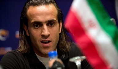 Ex-Iran player Ali Karimi target of death threats over protests support