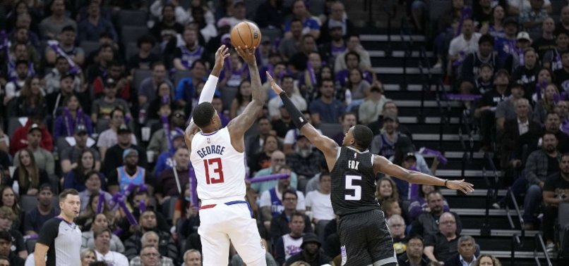 PAUL GEORGE SCORES 40 AS CLIPPERS EKE OUT WIN OVER KINGS