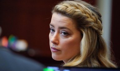 Amber Heard announces settlement in defamation case against Johnny Depp