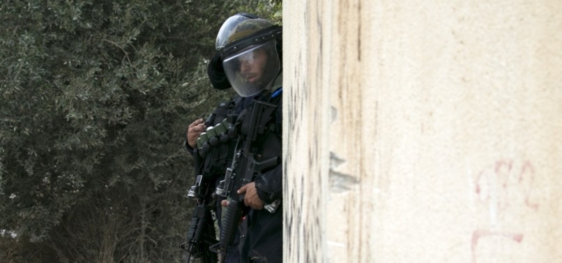 ISRAELI FORCES RAID VILLAGE TO FIND PALESTINIAN GUNMAN
