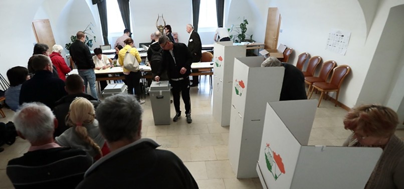 HUNGARIANS HEAD TO POLLS IN PARLIAMENTARY ELECTIONS