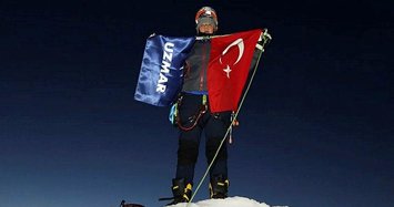 Turkish climate action team flies flag in Greenland