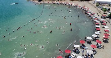 Lake Hazar attracting holidaymakers looking for places to cool off during summer