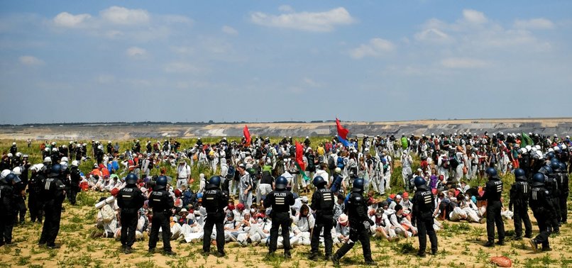 CLIMATE PROTESTERS STORM OPEN-PIT MINE IN WESTERN GERMANY