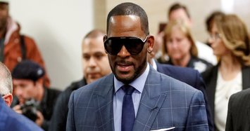 R. Kelly arrested in Chicago on child pornography charges