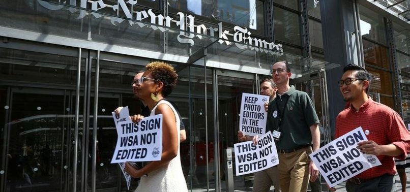 NEW YORK TIMES STAFF WALK OFF JOB TO PROTEST JOB CUTS