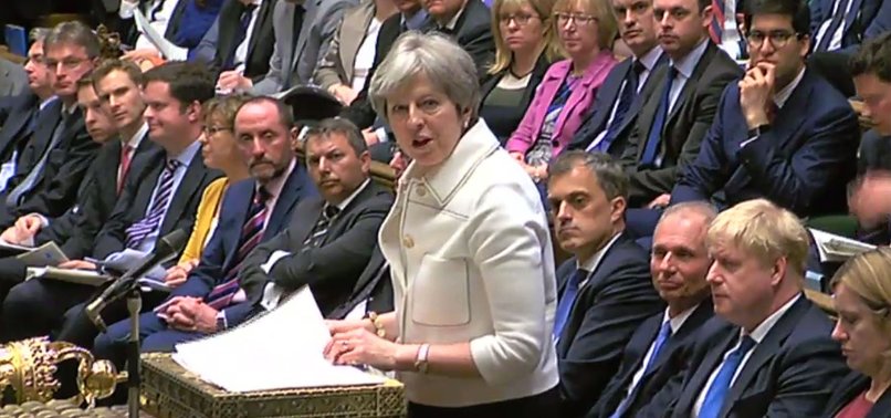 BRITISH PM MAY DEFENDS LEGAL AND MORAL STRIKES IN SYRIA