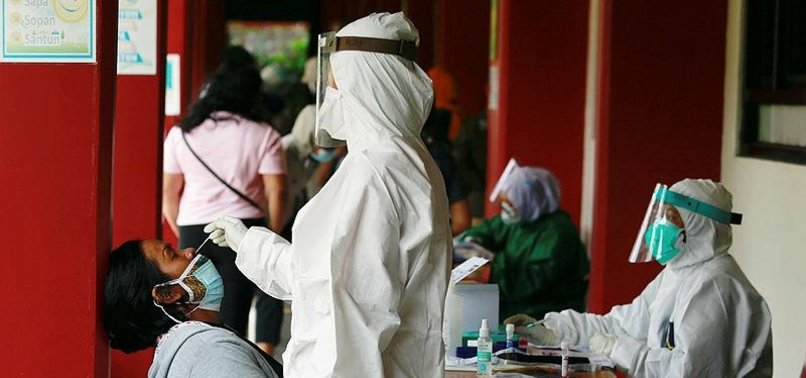 INDONESIA CAUGHT BETWEEN SURGE AND SLOW VACCINE ROLLOUT