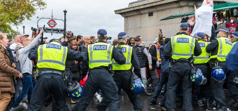 UK: Virus cases climb as protesters march in London